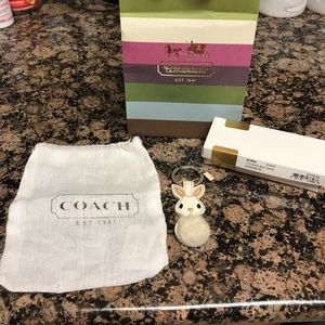 Gently used Coach white bunny key fob